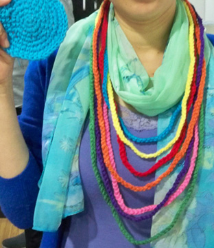 Chinese woman with her necklace and coaster